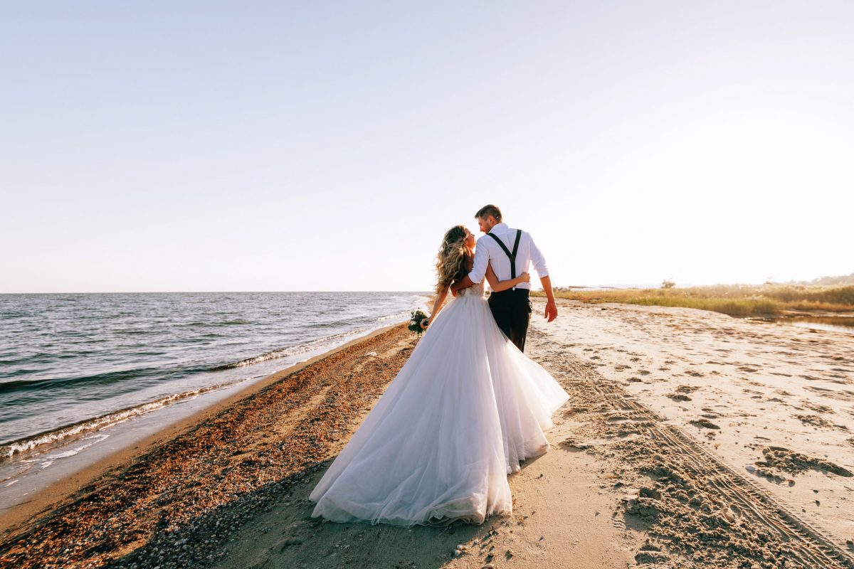 bride and groom on the seashore. wedding concept on the sea, on a fabulous island.